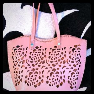 Laser cut, leather hand bag